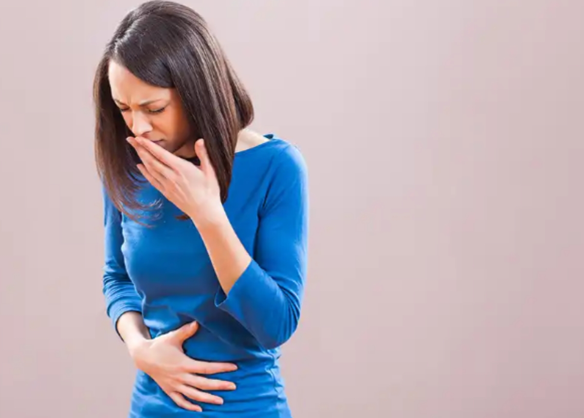 woman hold stomach and mouth