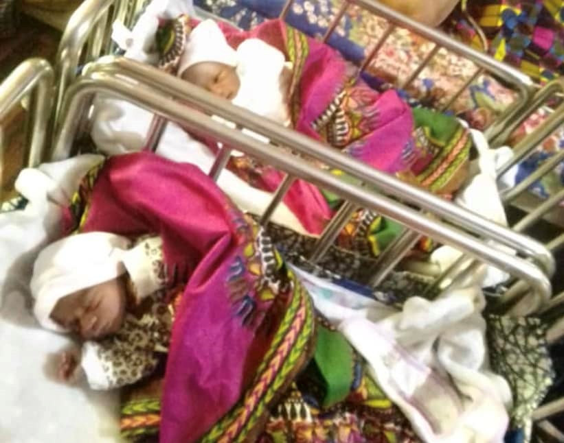 Family members celebrate as Nigerian woman gives birth to twins after years